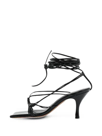 Pre-owned Andrea Wazen Gia Ankle-strap Leather Sandals In Black