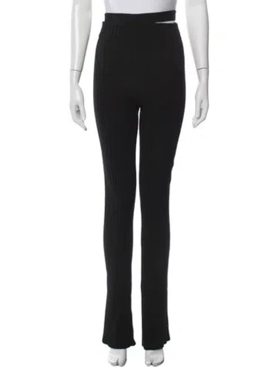 Pre-owned Andreädamo Flared Pants In Black