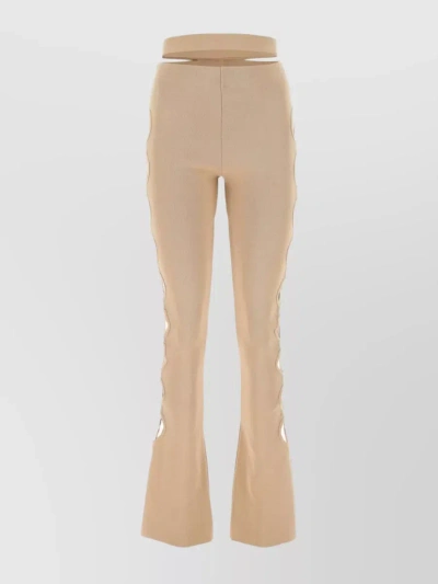Andreädamo Flared Silhouette Trousers With Side Cut-outs In Cream