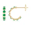 Angara Bezel-set Emerald Huggie Hoop Earrings In Yellow Gold/rich Medium Green