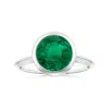 Angara Bezel-set Gia Certified Solitaire Round Emerald Knife-edged Shank Ring In White Gold/rich Medium Green