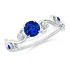 Angara Blue Sapphire And Diamond Ivy Scroll Engagement Ring In White Gold/deep Rich Blue