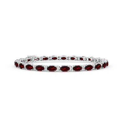 Angara Classic Oval Garnet And Diamond Tennis Bracelet In Metallic