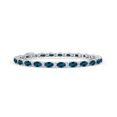 Angara Classic Oval London Blue Topaz And Diamond Tennis Bracelet In Metallic