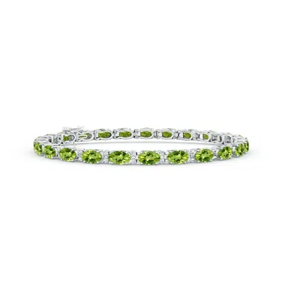 Angara Classic Oval Peridot And Diamond Tennis Bracelet In Green