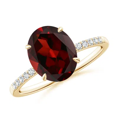 Angara Claw-set Oval Garnet Ring With Diamonds In Gold