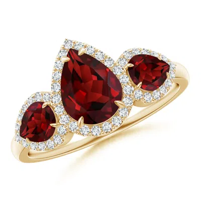 Angara Claw-set Pear Garnet Three Stone Ring With Diamond Halo In Red