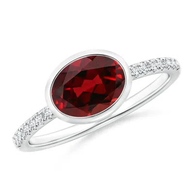 Angara East-west Bezel-set Oval Garnet And Diamond Ring In Red