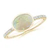 Angara East-west Bezel-set Oval Opal And Diamond Ring In Yellow Gold/milky With Medium Play Of Colour
