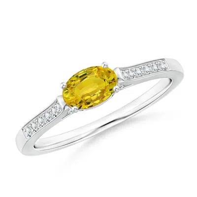 Angara East West Oval Yellow Sapphire Solitaire Ring With Diamonds In Metallic