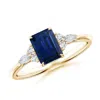 Angara Emerald-cut Blue Sapphire Side Stone Engagement Ring With Diamonds In Yellow Gold/medium To Rich Blue