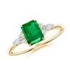 Angara Emerald-cut Emerald Side Stone Engagement Ring With Diamonds In Yellow Gold/rich Medium Green