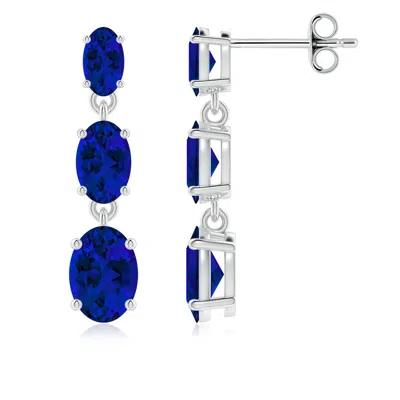 Angara Graduated Oval Lab-grown Blue Sapphire Three Stone Earrings