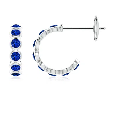 Angara Lab-grown Bezel-set Blue Sapphire Huggie Hoop Earrings In Metallic