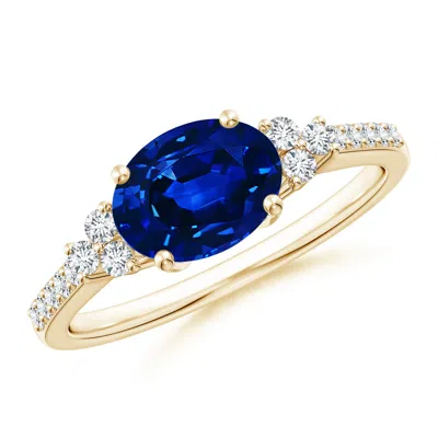 Angara Lab-grown Horizontally Set Oval Sapphire Solitaire Ring With Trio Lab Diamond Accents In Gold