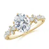 Angara Lab-grown Oval Diamond Side Stone Engagement Ring With Accents In Yellow Gold/f-g