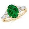 Angara Lab-grown Oval Emerald Side Stone Engagement Ring With Diamonds In Yellow Gold/rich Green