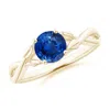 Angara Nature Inspired Blue Sapphire Crossover Engagement Ring With Leaf Motifs In Yellow Gold/medium To Rich Blue