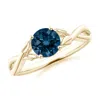 Angara Nature Inspired London Blue Topaz Crossover Ring With Leaf Motifs In Yellow Gold/deep Greenish Blue