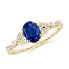 Angara Nature-inspired Oval Blue Sapphire Engagement Ring With Leaf Motifs In Yellow Gold/medium To Rich Blue