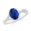 Angara Oval Blue Sapphire Split Shank Ring With Diamond Accents In White Gold/medium To Rich Blue