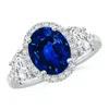 Angara Oval Lab-grown Blue Sapphire And Half Moon Diamond Halo Engagement Ring In White Gold/deep Rich Blue