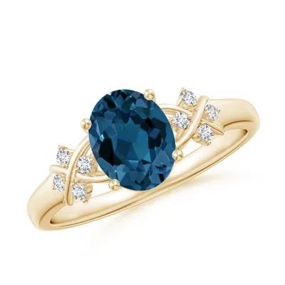 Angara Oval London Blue Topaz Criss Cross Ring With Diamonds In Gold
