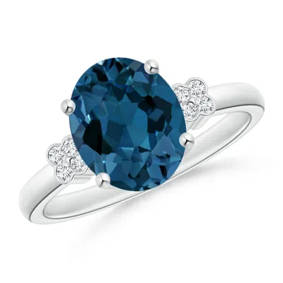 Angara Oval London Blue Topaz Ring With Diamond Floral Accents