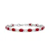 Angara Oval Ruby Swirl Bracelet With Bezel Diamonds In White Gold/medium Red