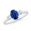 Angara Oval Sapphire And Round Diamond Three Stone Ring In White Gold/medium To Rich Blue