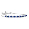Angara Oval Sapphire Bolo Bracelet With Diamond Halo In White Gold/medium To Rich Blue