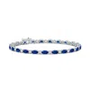 Angara Oval Sapphire Tennis Bracelet With Gypsy Diamonds In White Gold/medium To Rich Blue