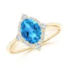 Angara Oval Swiss Blue Topaz Compass Ring With Diamond Halo In Yellow Gold/swiss Blue