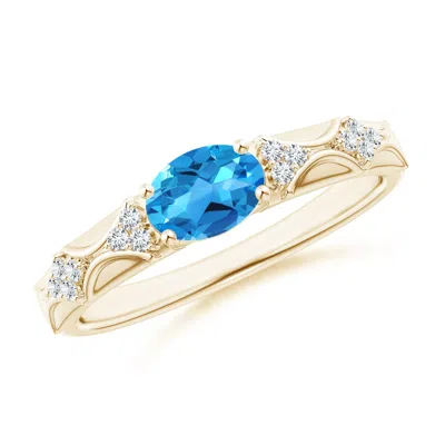Angara Oval Swiss Blue Topaz Vintage Style Ring With Diamond Accents In Gold