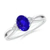 Angara Oval Tanzanite Split Shank Ring With Trio Diamonds In White Gold/deep Rich Violet Blue