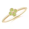 Angara Peridot Four Leaf Clover Ring With Beaded Shank In Yellow Gold/yellowish Green