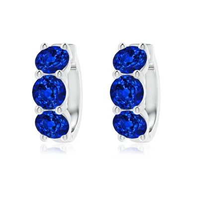Angara Round Lab-grown Blue Sapphire Three Stone Hoop Earrings In Metallic