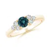 Angara Round Teal Montana Sapphire Solitaire Ring With Trio Diamonds In Yellow Gold/medium Greenish Blue