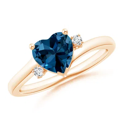 Angara Solitaire Heart London Blue Topaz Bypass Ring With Diamonds