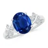 Angara Solitaire Oval Blue Sapphire Criss Cross Ring With Diamonds In White Gold/medium To Rich Blue