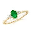 Angara Solitaire Oval Emerald Ring With Trio Diamond Accents In Yellow Gold/rich Green