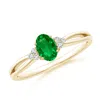 Angara Solitaire Oval Emerald Split Shank Engagement Ring With Trio Diamonds In Yellow Gold/rich Green