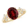 Angara Solitaire Oval Garnet Criss Cross Ring With Diamonds In Yellow Gold/rich Red