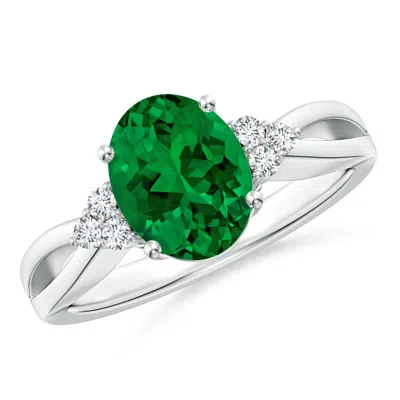 Angara Solitaire Oval Lab-grown Emerald Split Shank Engagement Ring With Trio Diamonds In Metallic