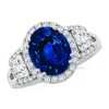 Angara Three Stone Oval Lab-grown Blue Sapphire And Trapezoid Diamond Halo Engagement Ring In White Gold/deep Rich Blue