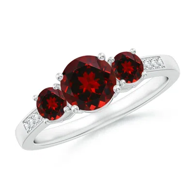 Angara Three Stone Round Garnet Ring With Diamond Accents In Red