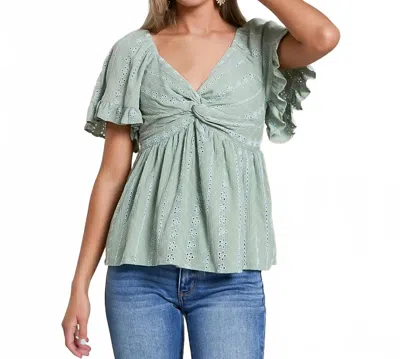 Angie Twisted Front Peplum Top In Desert Sage In Blue