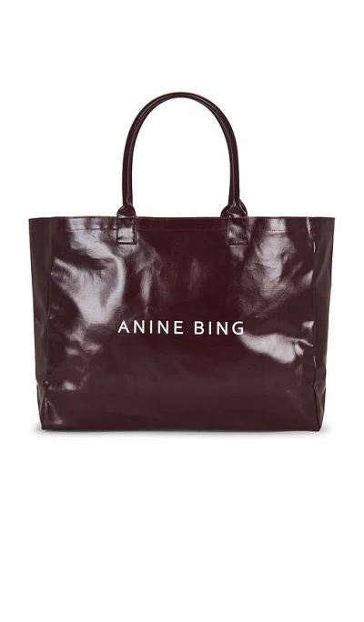 Anine Bing Leo Coated Canvas Tote Bag In Burgundy