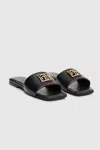 Anine Bing Ria Slides Monogram In Black In Black