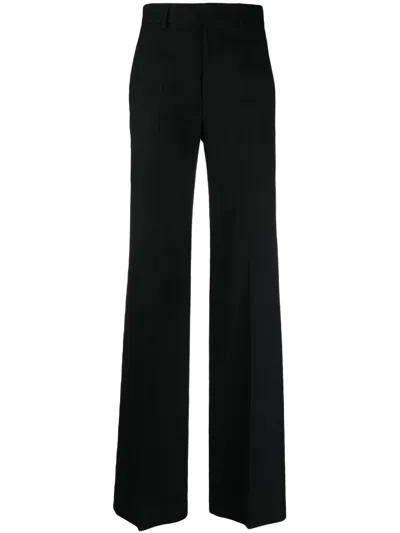 ANN DEMEULEMEESTER MAAIKE PRESSED-CREASE FLARED TROUSERS